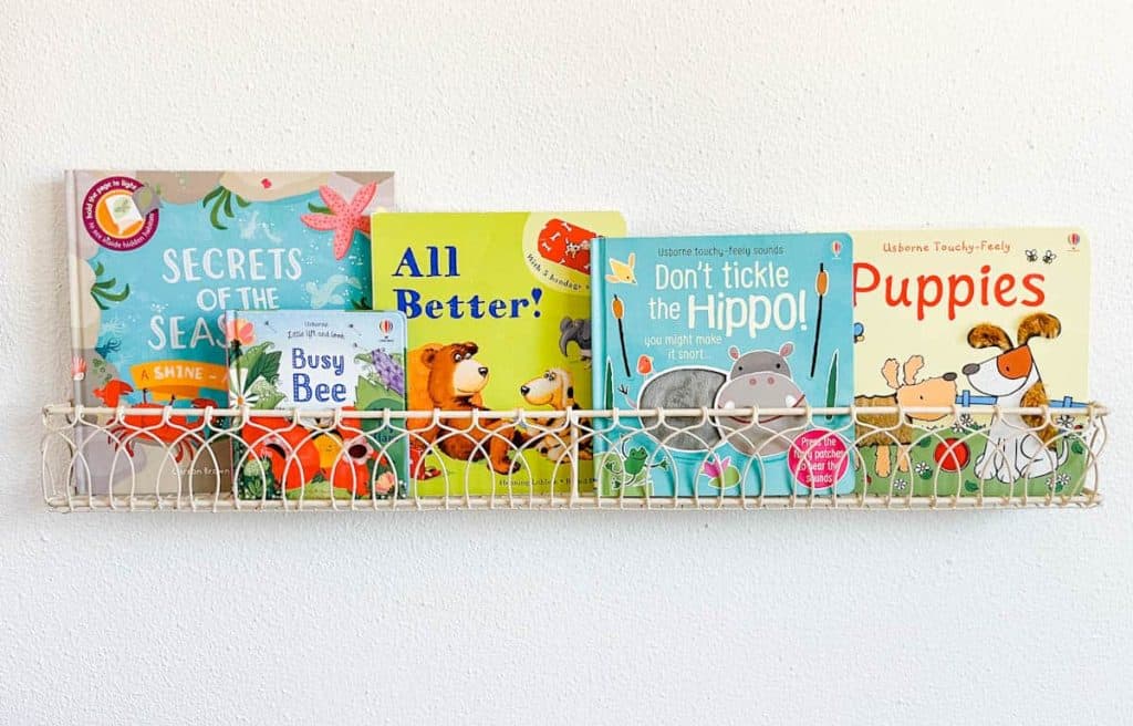Usborne Books for toddlers and preschoolers in a line on a shelf