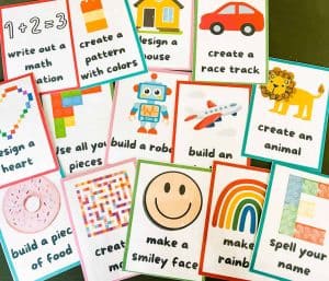 Lego challenge cards laying on table