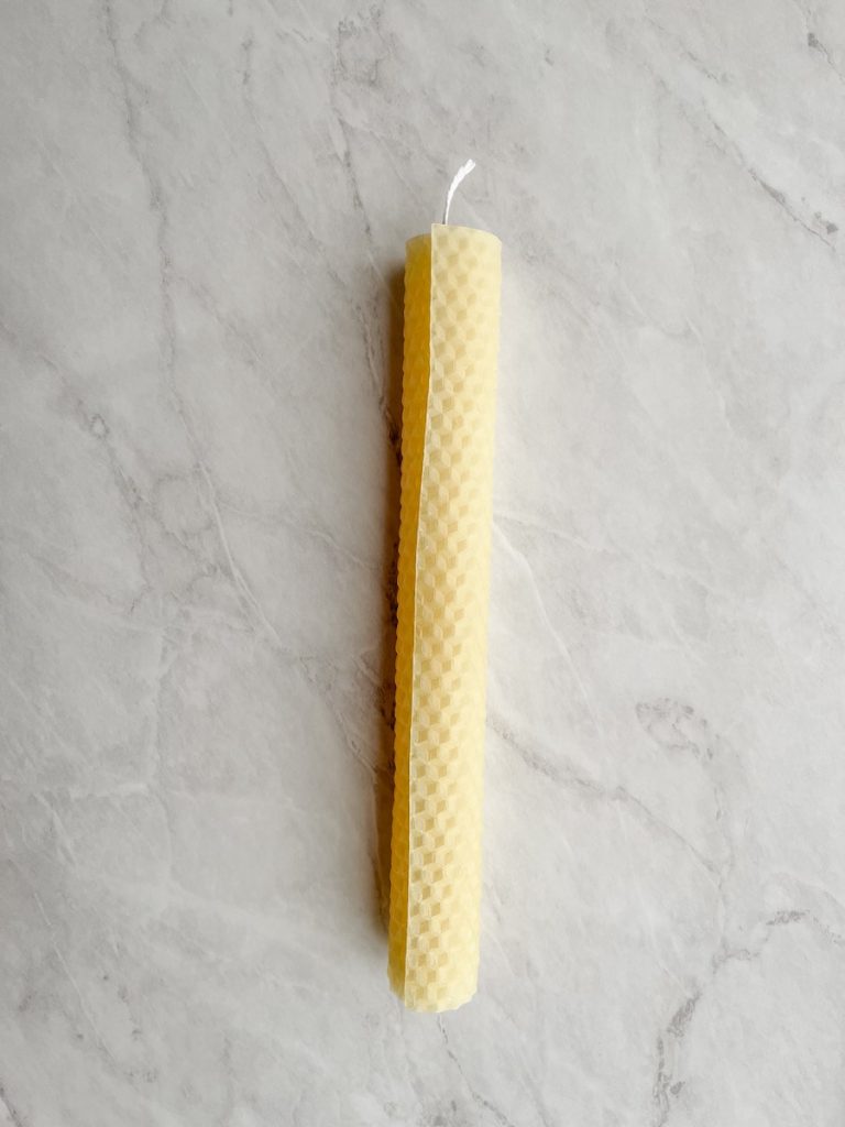 finished beeswax rolled candle on counter