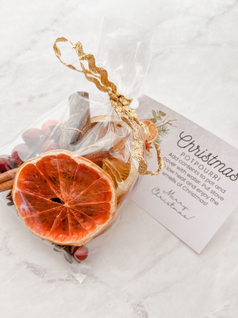 Christmas potpourri gift with gift tag laying on the counter