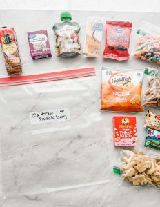 ziplock bag on table surrounded by snacks