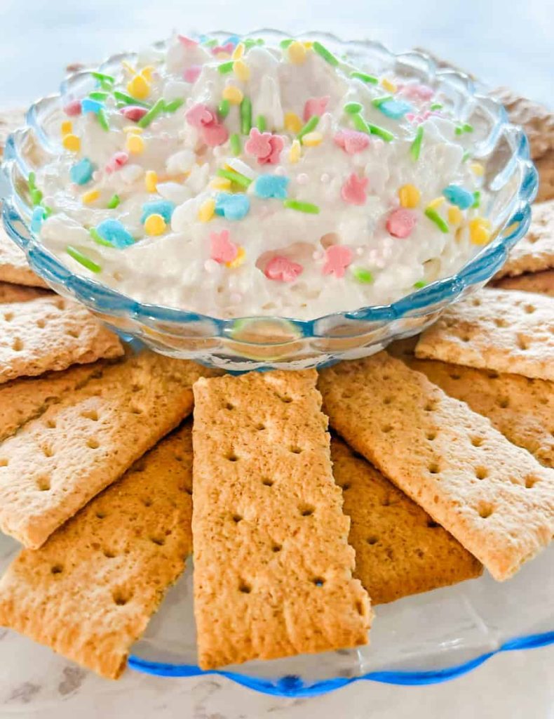 funfetti dip recipe with easter sprinkles on top to make it an easter dessert