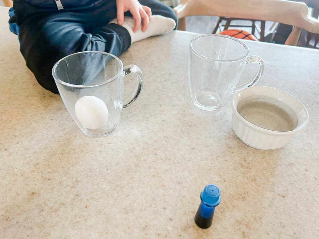egg in clear glass cup