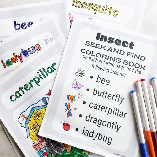 coloring pages spread out on table that have been colored with markers next to it