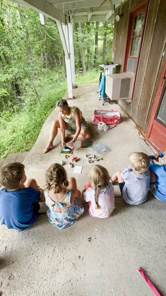 aunt Amy teaching kids how to make seed paper