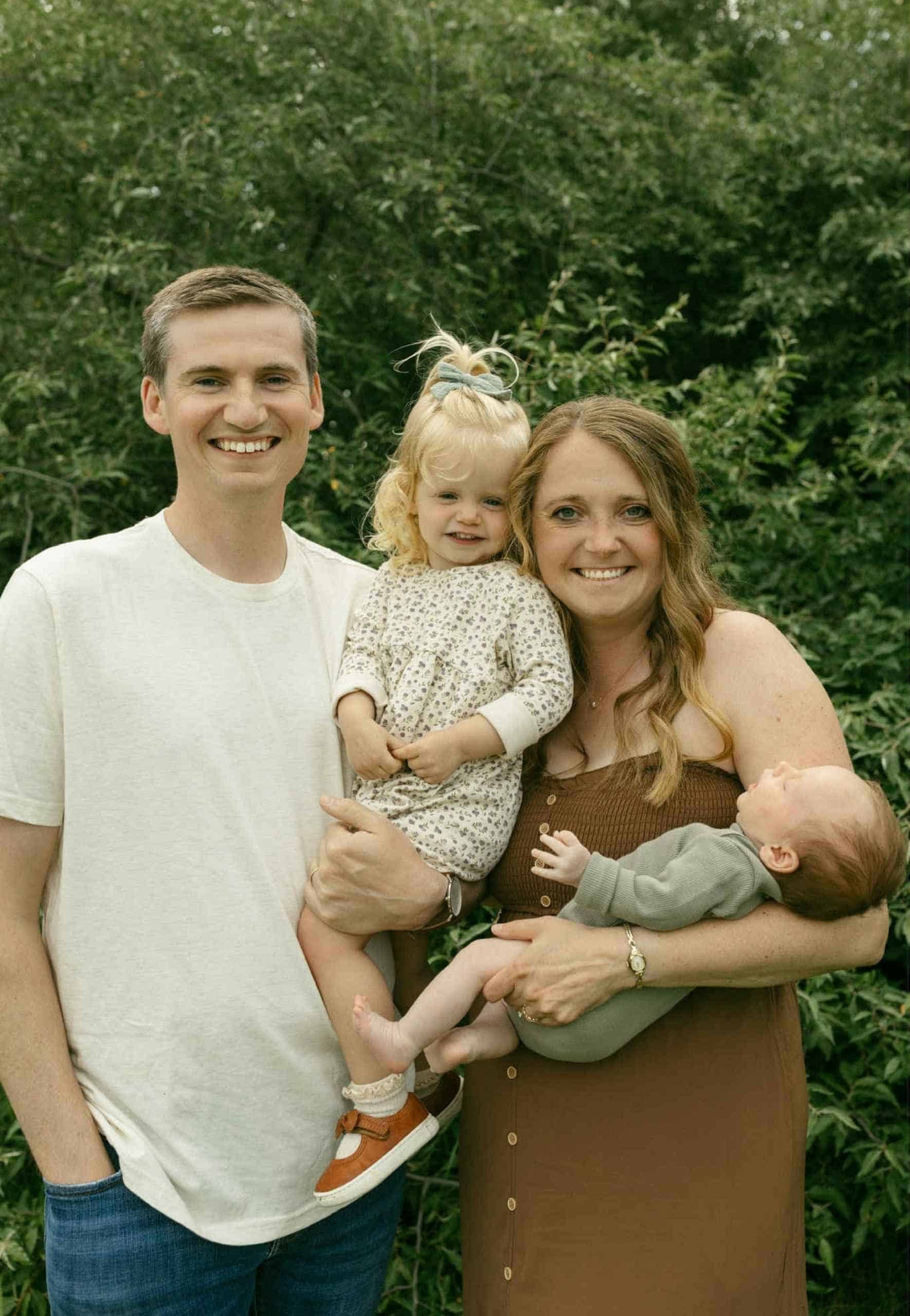 Laura with her husband and kids