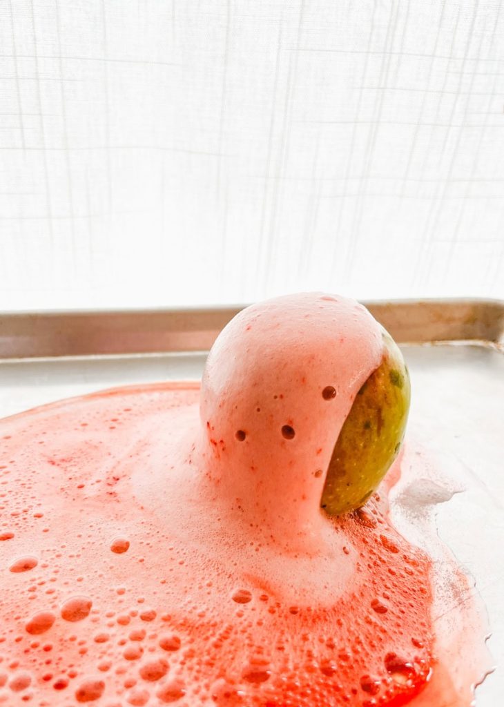 red overflowing apple volcano on a pan