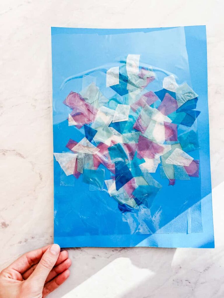 snowflake outline covered with a second piece of contact paper