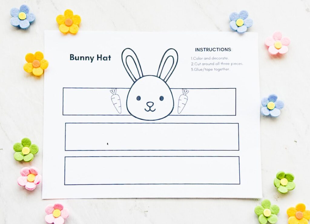 Printable template of bunny hat on table with flowers around it