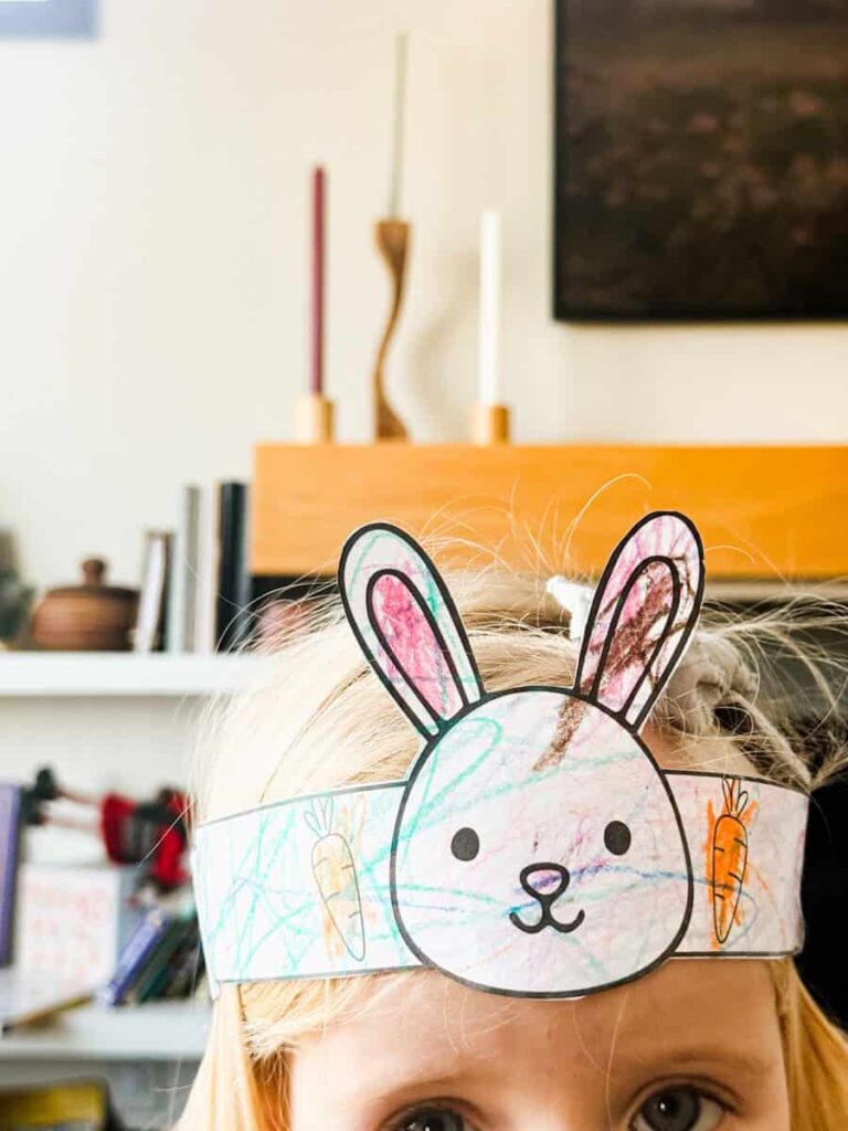 child wearing her completed hat