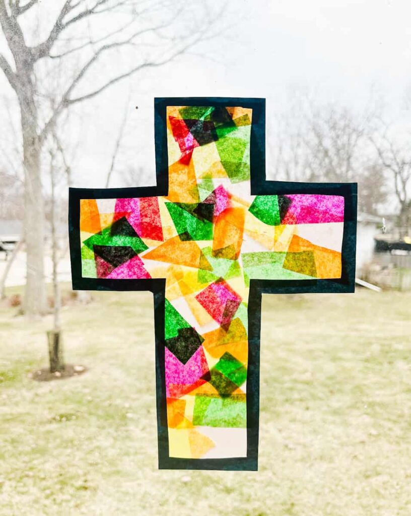 finished cross suncatcher hanging on the window