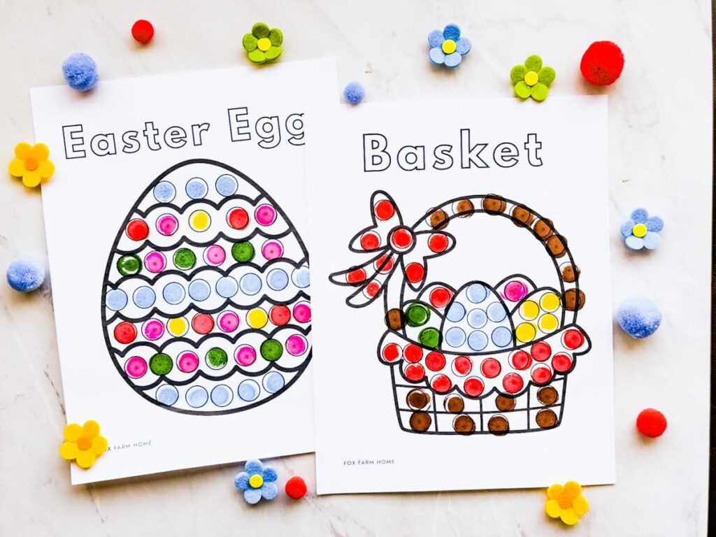 two completed dot marker pages including the easter egg and basket on table with flowers around it