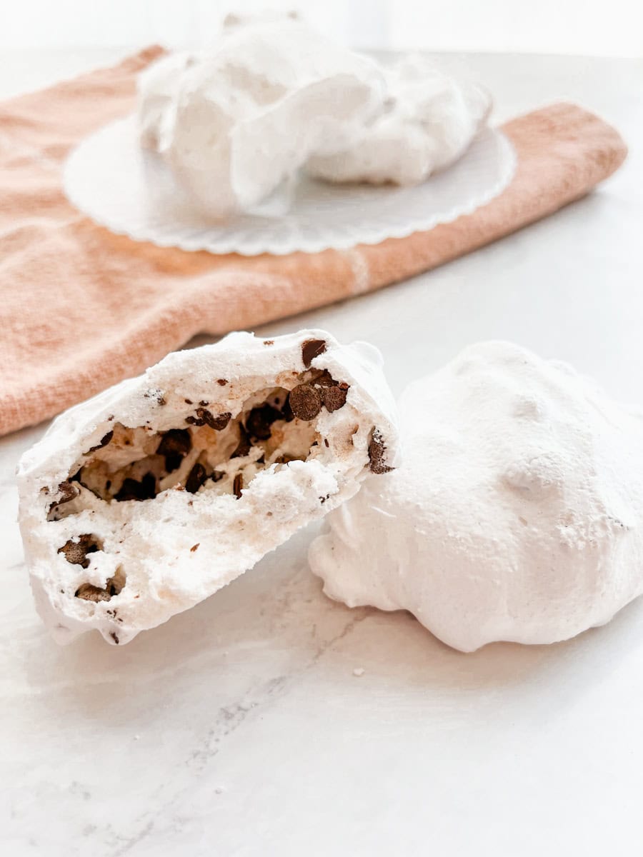 hollow resurrection cookie sitting on a counter with a towel and more cookies in the background 