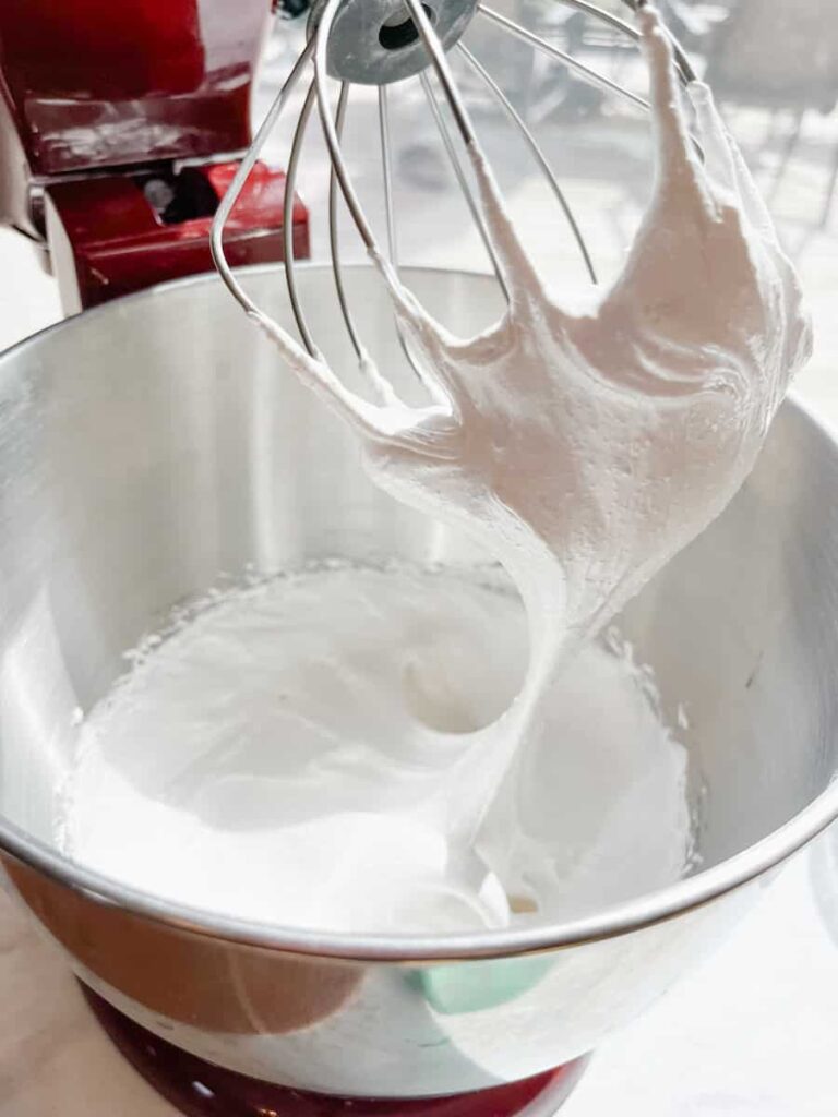 egg whites beaten till stiff peaks have formed.