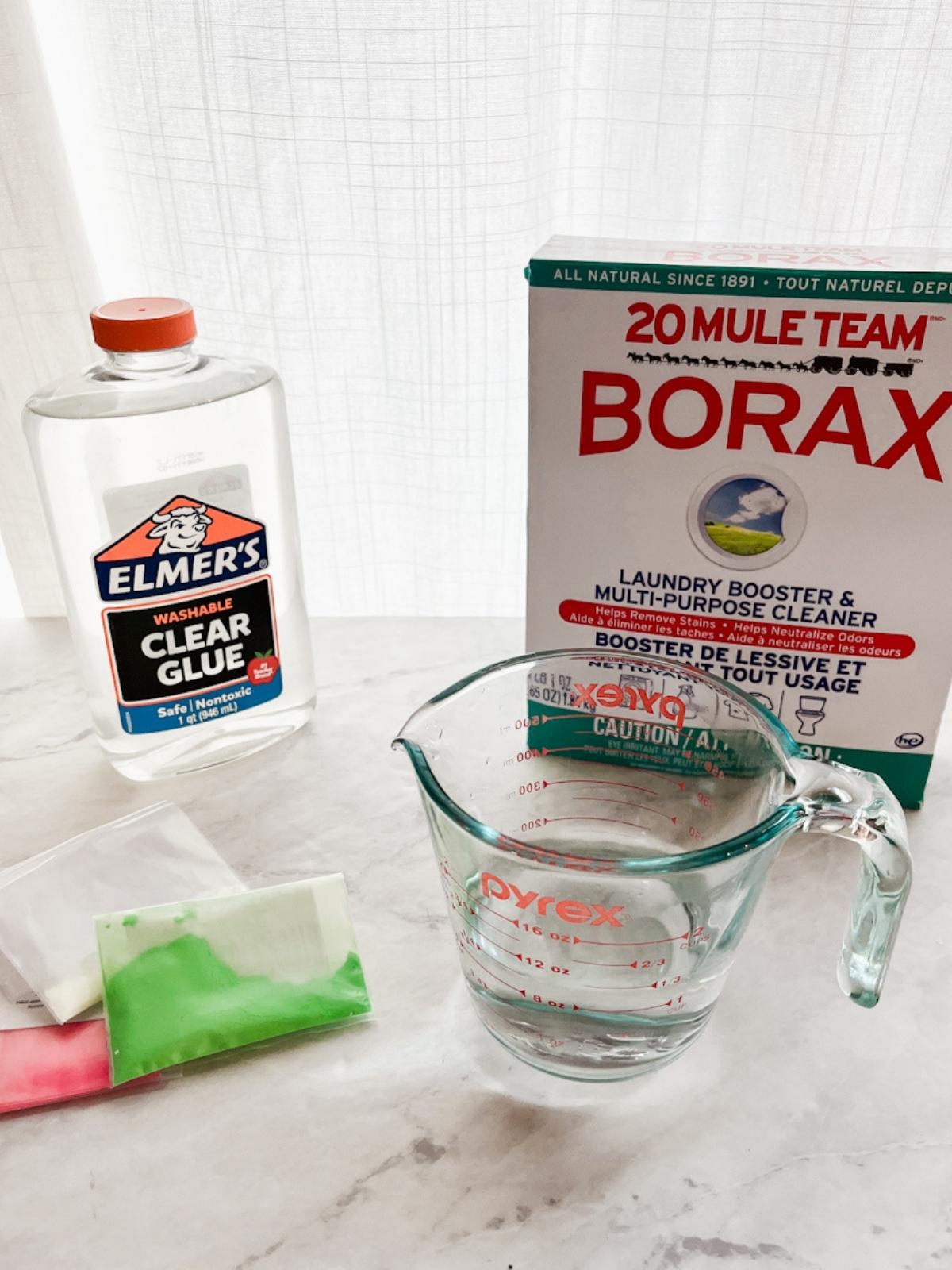 Ingredients for homemade slime that glows in the dark.