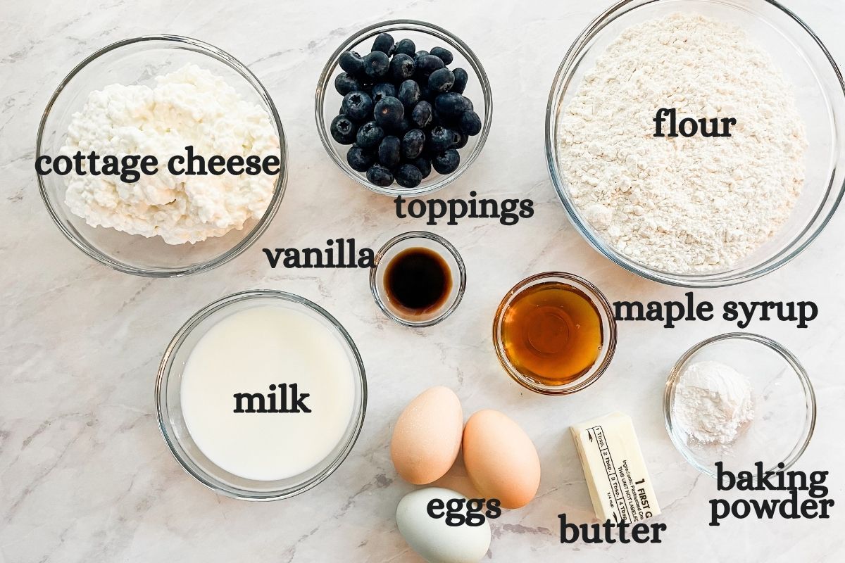 All of the ingredients for sheet pan pancakes on the counter and labeled.