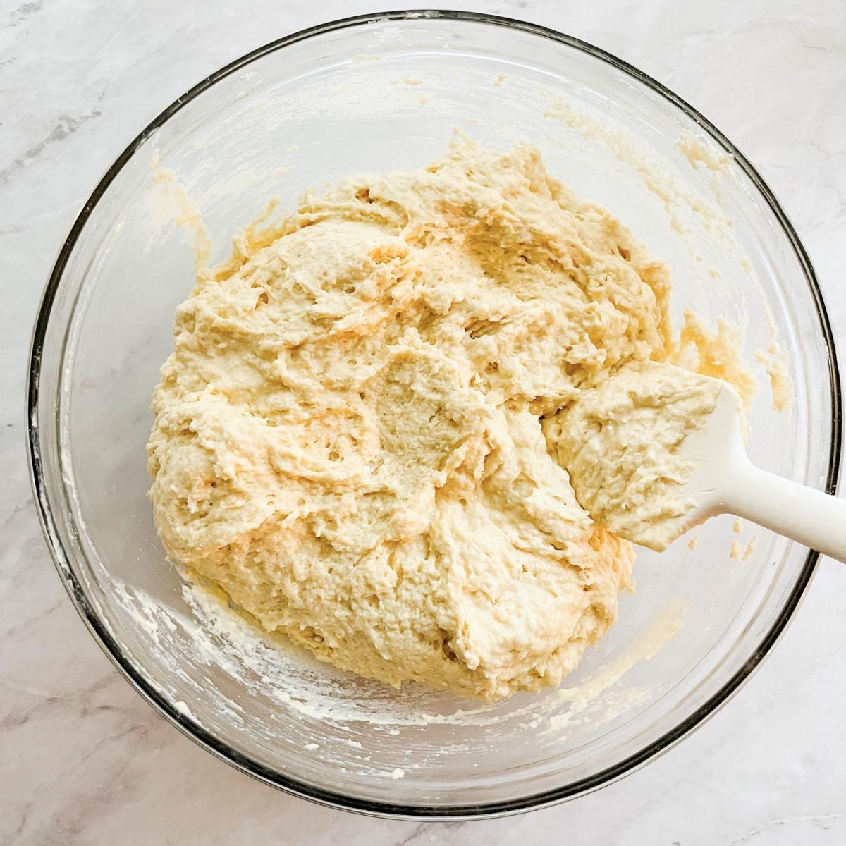 The wet ingredients incorporated into the dry ingredients.